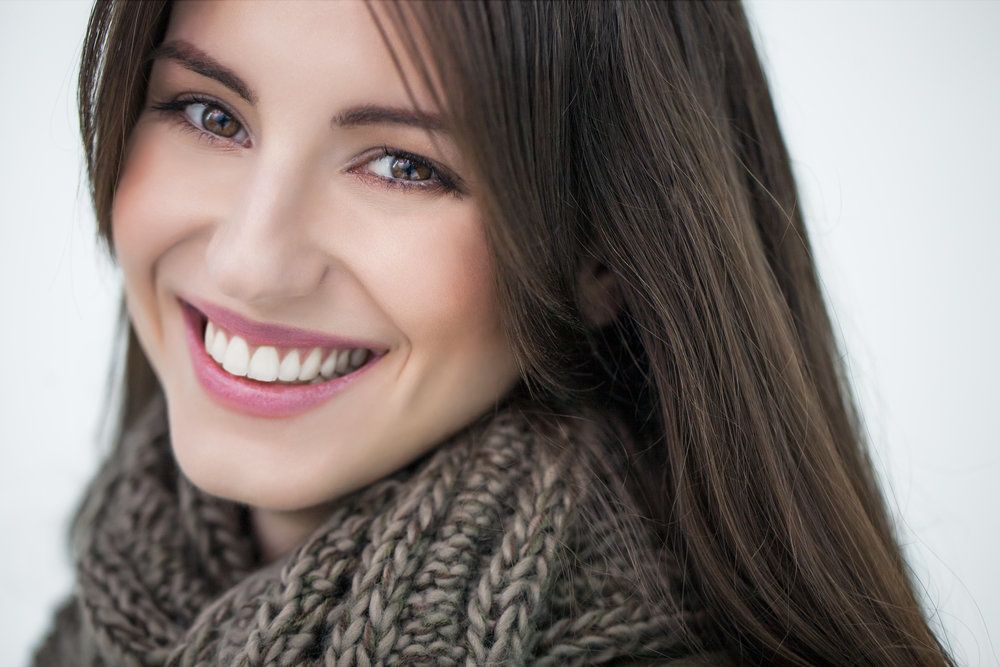 Woman with beautiful teeth smiling.